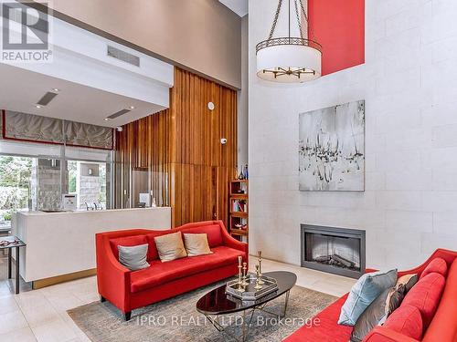 #103 -18 Kenaston Gdns, Toronto, ON - Indoor Photo Showing Living Room With Fireplace