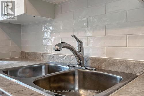 #110 -921 Midland Ave, Toronto, ON - Indoor Photo Showing Kitchen With Double Sink
