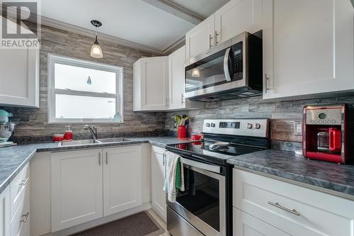 87 Trinity South Highway, South Dildo, NL - Indoor Photo Showing Kitchen With Double Sink