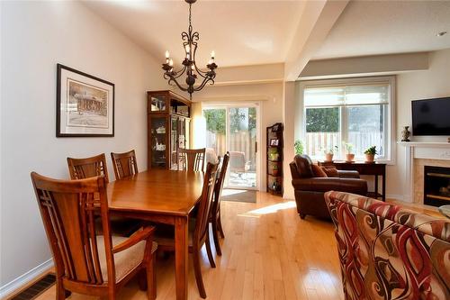 81 Valridge Drive|Unit #36, Ancaster, ON - Indoor Photo Showing Dining Room With Fireplace