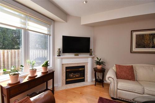 81 Valridge Drive|Unit #36, Ancaster, ON - Indoor Photo Showing Living Room With Fireplace