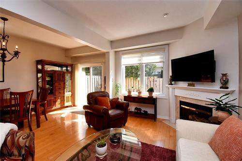 81 Valridge Drive|Unit #36, Ancaster, ON - Indoor Photo Showing Living Room With Fireplace