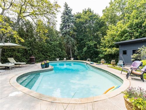1910 Kerns Road, Burlington, ON - Outdoor With In Ground Pool With Backyard