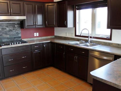 103 Willow Court, Rainy River, ON - Indoor Photo Showing Kitchen With Double Sink