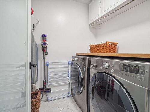 Salle de lavage - 103-100 Rue Cartier, Saint-Lambert, QC - Indoor Photo Showing Laundry Room