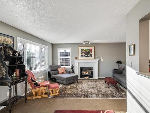 307-951 Topaz Ave, Victoria, BC - Indoor Photo Showing Living Room With Fireplace