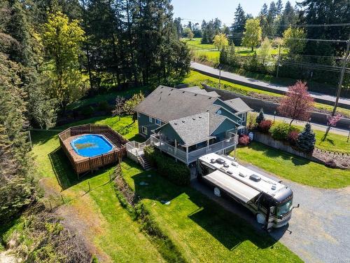 2049 Herd Rd, Duncan, BC - Outdoor With Above Ground Pool With Deck Patio Veranda With Backyard