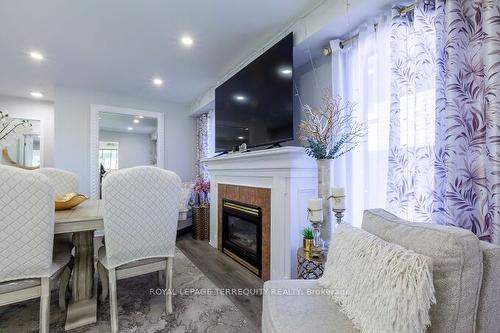 47 Cove Cres, Hamilton, ON - Indoor Photo Showing Living Room With Fireplace