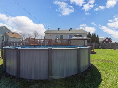 Pool - 165 Rue Des Tourelles, Saint-Paul, QC - Outdoor With Above Ground Pool With Backyard