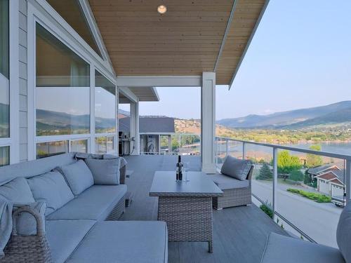 7345 Pointe Sage Drive, Coldstream, BC - Outdoor With Body Of Water With Deck Patio Veranda With Exterior