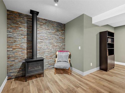 13009 Gibbons Drive, Lake Country, BC - Indoor With Fireplace