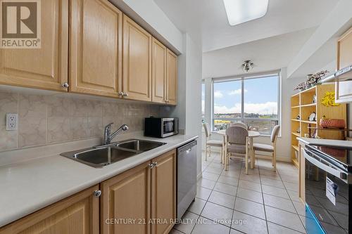 #703 -3088 Kennedy Rd, Toronto, ON - Indoor Photo Showing Kitchen With Double Sink