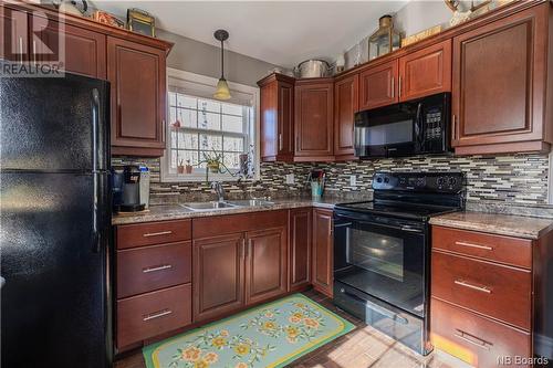 7 Holland Lane, Cambridge-Narrows, NB - Indoor Photo Showing Kitchen With Double Sink