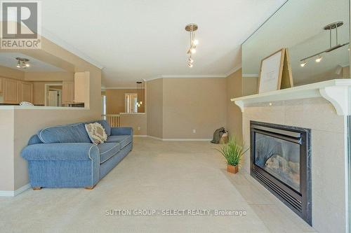 34 - 14 Doon Drive, London, ON - Indoor Photo Showing Living Room With Fireplace