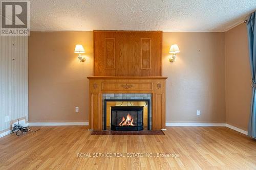 640 Sherbrooke St, Peterborough, ON - Indoor Photo Showing Living Room With Fireplace