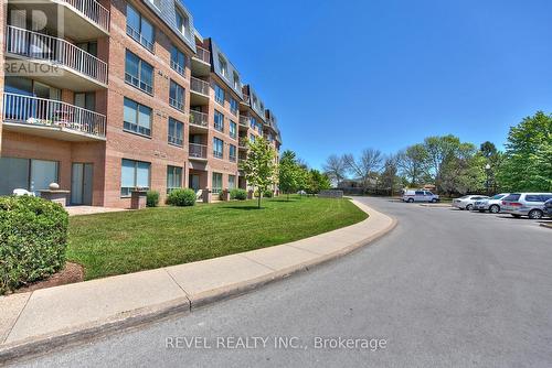 226 - 8111 Forest Glen Drive, Niagara Falls, ON - Outdoor With Balcony With Facade
