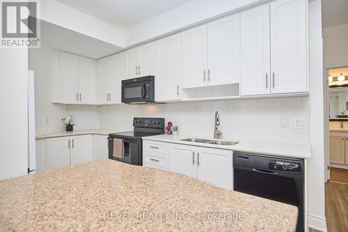 #226 -8111 Forest Glen Dr, Niagara Falls, ON - Indoor Photo Showing Kitchen With Double Sink