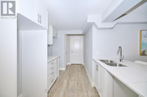 22 Queens Circ, Fort Erie, ON - Indoor Photo Showing Kitchen With Double Sink
