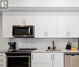 19 - 3429 Ridgeway Drive, Mississauga, ON  - Indoor Photo Showing Kitchen With Upgraded Kitchen 