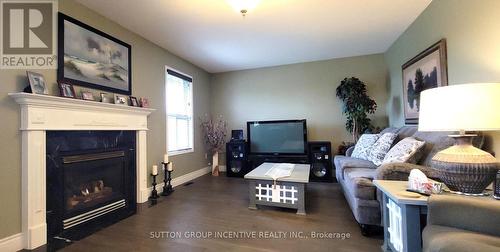 92 Sundew Dr, Barrie, ON - Indoor Photo Showing Living Room With Fireplace