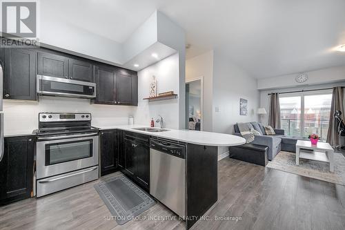 #307 -720 Yonge St, Barrie, ON - Indoor Photo Showing Kitchen With Double Sink With Upgraded Kitchen