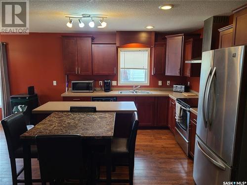 207 W 1St Street, Carlyle, SK - Indoor Photo Showing Kitchen With Stainless Steel Kitchen With Double Sink