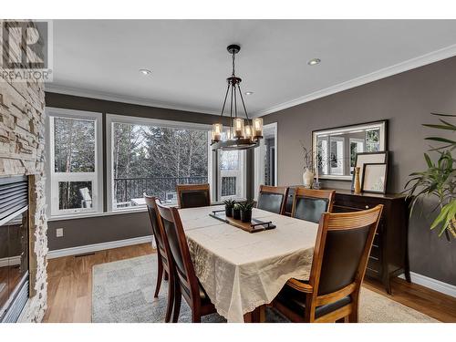 2274 Sadler Drive, Prince George, BC - Indoor Photo Showing Dining Room With Fireplace
