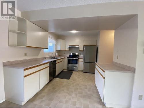 6 2609 Braun Street, Terrace, BC - Indoor Photo Showing Kitchen With Double Sink