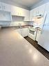 4003 Kilmer Drive|Unit #309, Burlington, ON  - Indoor Photo Showing Kitchen With Double Sink 