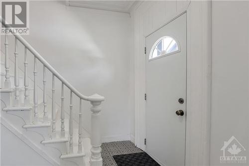 Entrance, original oak stairs! - 10600 Main Street, South Mountain, ON - Indoor Photo Showing Other Room