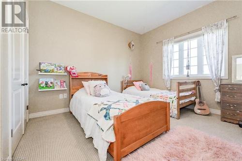 7456 Wellington Road 11, Mapleton, ON - Indoor Photo Showing Bedroom