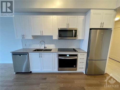 805 Carling Avenue Unit#3002, Ottawa, ON - Indoor Photo Showing Kitchen With Double Sink