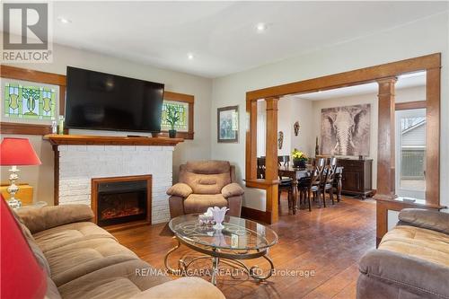 100 Elgin St, Port Colborne, ON - Indoor Photo Showing Living Room With Fireplace