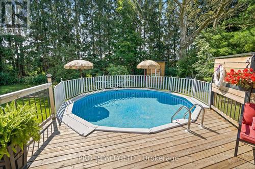 381 Cummings Crescent, Centre Wellington, ON - Outdoor With Above Ground Pool With Deck Patio Veranda