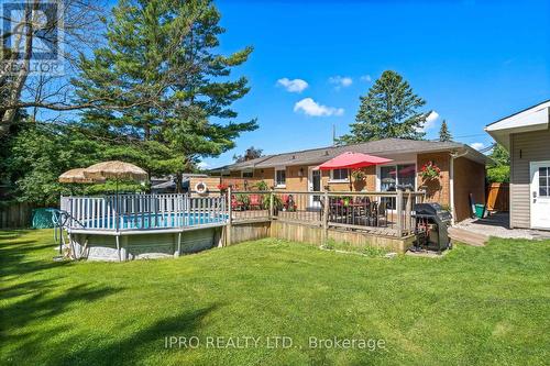 381 Cummings Crescent, Centre Wellington, ON - Outdoor With Above Ground Pool With Deck Patio Veranda