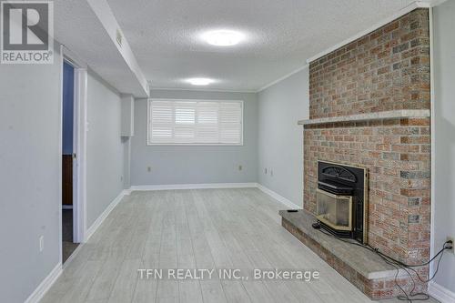 15 Lankin Boulevard, Orillia, ON - Indoor Photo Showing Other Room With Fireplace