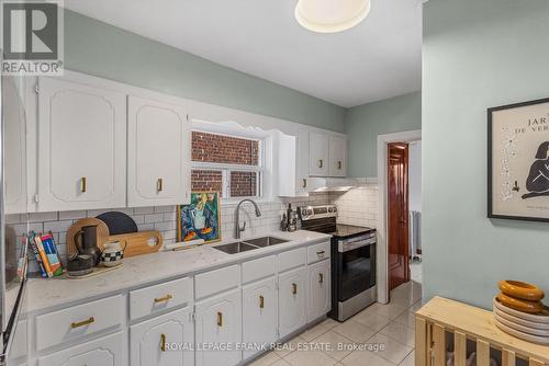 275 Mortimer Ave, Toronto, ON - Indoor Photo Showing Kitchen With Double Sink
