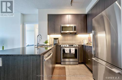 503 - 50 Thomas Riley Road, Toronto, ON - Indoor Photo Showing Kitchen With Upgraded Kitchen