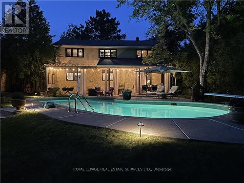 1910 Kerns Rd, Burlington, ON - Outdoor With In Ground Pool