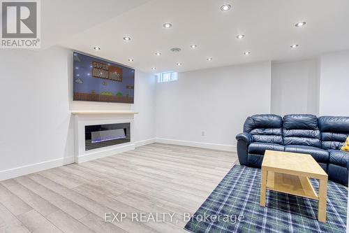 492 Stone Church Rd E, Hamilton, ON - Indoor Photo Showing Living Room With Fireplace