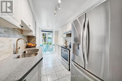 #708 -28 Rosebank Dr, Toronto, ON - Indoor Photo Showing Kitchen With Double Sink With Upgraded Kitchen