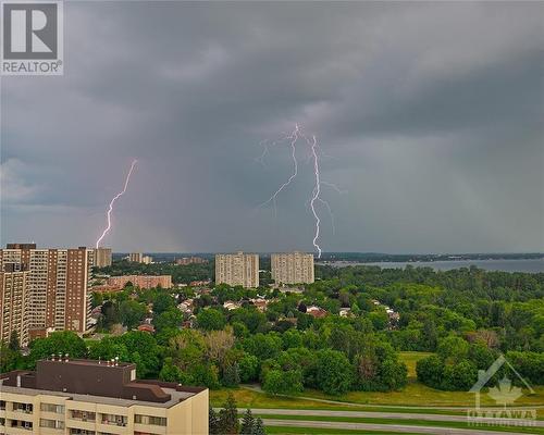 View of lightning from balcony - 1171 Ambleside Drive Unit#2307, Ottawa, ON - Outdoor With View