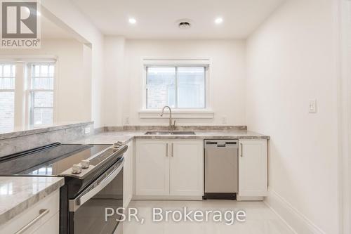 25 Coulson Ave, Toronto, ON - Indoor Photo Showing Kitchen With Double Sink