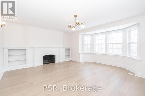 25 Coulson Ave, Toronto, ON - Indoor With Fireplace
