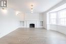 25 Coulson Ave, Toronto, ON  - Indoor With Fireplace 