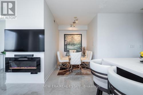 #1408 -385 Prince Of Wales Dr, Mississauga, ON - Indoor With Fireplace