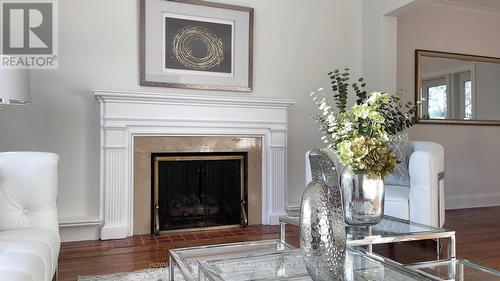 19 Strathgowan Crescent, Toronto, ON - Indoor Photo Showing Living Room With Fireplace