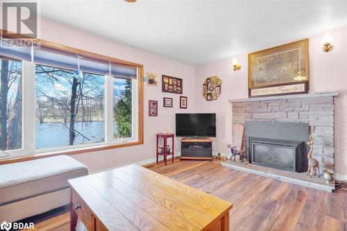 301 Sherry Road, Thomasburg, ON - Indoor Photo Showing Living Room With Fireplace