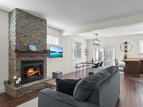 8-344 Hirst Ave, Parksville, BC - Indoor Photo Showing Living Room With Fireplace