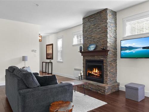 8-344 Hirst Ave, Parksville, BC - Indoor Photo Showing Living Room With Fireplace